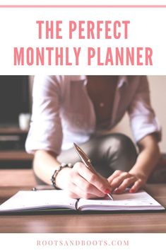 a woman sitting at a desk writing in a notebook with the words, the perfect month planner