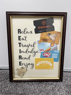 a framed sign with some stickers on it that says relax eat travel indulge read enjoy