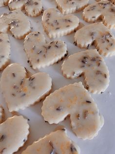 some cookies are sitting on a white table