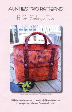 an orange bag sitting on top of a wooden table