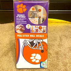 an orange and white package with clemson logo on it