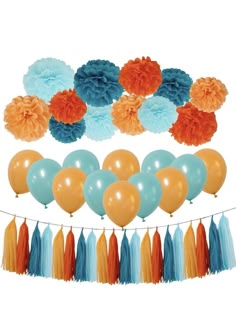 a bunch of balloons and tassels on a string with tissue pom poms