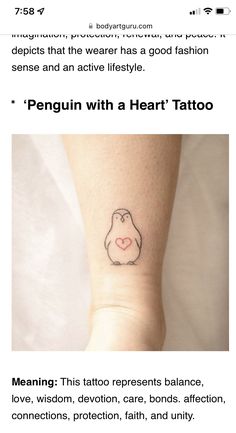 a small penguin tattoo on the wrist with words written below it and an image of a heart