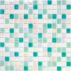 a green and white tiled wall with small square tiles on it's sides, all in different colors