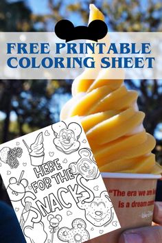 an ice cream cone with the words free printable coloring sheet on it and a hand holding