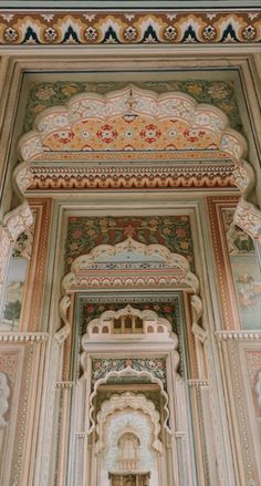 an ornate doorway in the middle of a building