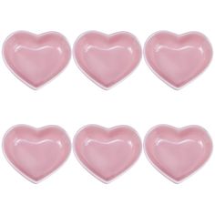 six pink heart shaped plates on a white background