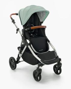 a baby stroller with a green canopy on it's head and wheels, in front of a white background