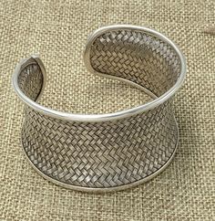 "Braided Sterling Silver Statement Boho Cuff Bracelet, Handmade Wide Woven white Silver Ethnic Bangle, Tribal Weave Adjustable Cuff Width: Front side 1 9/16 inches (1.6\") / 4cm Longer versions (2.75\" and 4.3\"): https://www.etsy.com/listing/603575462 https://www.etsy.com/listing/569455658 Metal Purity: 95% Silver (Purer than 925 Sterling Silver) We also have designs version of Braided cuff : https://www.etsy.com/listing/253985429/wide-woven-silver-cuff-bracelet-extra?ref=shop_home_active_24 An Boho Cuff Bracelet, Statement Cuff Bracelet, Boho Cuff, Silver Cuff Bracelet, Bracelet Handmade, Silver Cuff, White Silver, Cuff Bracelet, Cuff Bracelets