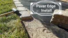 there is a sign that says paver edge install