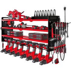 a red and black tool rack filled with tools