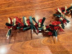 several bows are tied together on the table for christmas decorations and decorating items to decorate