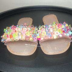 Nwt- Multi Color Gem Slide Sandals - Nude Various Sizes Available Details & Fit * Sandal * Open Toe * No Heel: Less Than 1 Inches * Rhinestones * Slides * Sparkle * Gems Look Radiant When The Light Hits Them Plastic Open Toe Sandals For Party, Pink Plastic Jelly Sandals For Party, Pink Plastic Party Sandals, Multicolor Flat Synthetic Jelly Sandals, Multicolor Plastic Beach Sandals, Casual Plastic Sandals For Party, Flat Plastic Jelly Sandals For Party, Multicolor Flat Sandals For Parties, Multicolor Synthetic Jelly Sandals For Spring