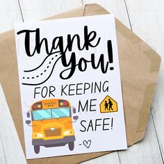 a thank you card with the words for keeping me safe and a yellow school bus