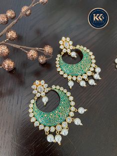 Gorgeous Powder Meenakari American Diamond Pearl Drops Chandbali Earrings. 😍Ready to ship from Edison, NJ WHAT GOES IN 👉🏻High Quality Craftsmanship, American Diamond & Pearls on brass based with powder Meenakari in pink, green and gold. 👉🏻Style this Chandbali earrings with any Indian Attire. GIFT IDEAS 👉🏻Ideal Gift for Loved ones, Wife, Mother, Sister. Excellent gift for Birthday, Anniversary, Festivals and Celebrations. 👉🏻If certain pieces are intended as gifts, please leave us a n Cheap Green Chandbali Jewelry, Green Chandbali Chandelier Earrings, Green Beaded Chandbali Jewelry, Elegant Green Chandbali Pearl Earrings, Green Dual-tone Chandbali Jewelry, Mint Green Earrings, Aqua Mint, Chandbali Earrings, Pearl Bangle