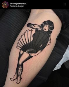 a woman with a fan tattoo on her arm is shown in black and grey colors