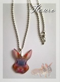 A stylish plastic rabbit head pendant necklace ... The frames, connectors, chain and clasp are silver metal. Dimension pendant: 4 cm x 3 cm Chain length: about 62 cm Rabbit Head, Garnet Heart, Watermelon Pattern, Garnet Jewelry, Energy Stones, Little Pigs, Heart Earrings, Chain Lengths, Pendant Necklaces