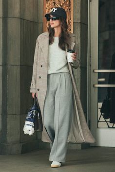 From WFH looks to street style, we're completely obsessed with the vibes of the Lulus Poised Coziness Heather Grey Pintuck Wide-Leg Sweatpant Trousers! Soft heathered sweater knit fabric shapes these versatile, sweatpants-style trousers that have a high waist and a hidden zip fly with a top clasp closure. Wide legs boast stylish pintuck details, pleated accents, and side seam pockets, ending at ankle-length hems. Elastic at back for fit. Fit: This garment fits true to size. Length: Floor length. Grey Trousers Outfit Winter, Grey Wide Leg Sweatpants Outfit, Winter Smart Casual Women, Wide Leg Trousers Outfit Work, Casual Trousers Outfit, Trousers Outfit Work, Wide Leg Sweatpants Outfit, Versatile Sweatpants, Wide Leg Trousers Outfit