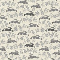 a pattern with rabbits and leaves on it