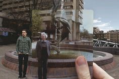 a person holding up a polaroid with an image of two people in front of a fountain