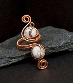 Boho copper ring.This ring is made of 1.25 mm copper wire wrapped with  8mm White Howlite gray veining Coin .This ring are basically adjustable ,Custom sizing can be done to ensure a comfortable fit for larger ,medium or small rings.These items comes packaged in a small rings boxes ready for gifts giving.If you have any questions about it, please do not hesitate to ask. Thank youImage may look different (color) due to many monitor or device resolutions. Adjustable Copper Spiritual Rings, Adjustable Bronze Toe Ring, Adjustable Copper Nickel-free Rings, Bronze Copper Open Ring Jewelry, Nickel-free Copper Ring, Adjustable Nickel-free Copper Ring, Bronze Copper Open Ring, Adjustable Copper Toe Ring Jewelry, Handmade Adjustable Bronze Rings