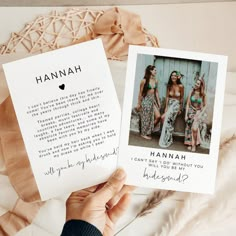 a person holding up two cards that say hannah