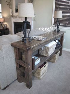 a living room filled with furniture and a fire place