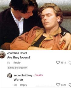 two men sitting next to each other in front of a poster with the caption, jonathan heart are they lovers?