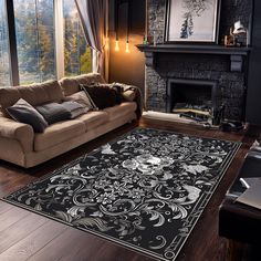 a living room filled with furniture and a large rug on top of a hard wood floor