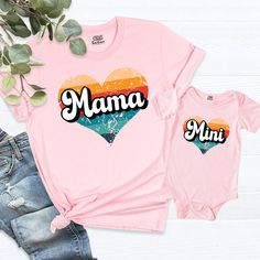 Retro Heart Mama Mini Shirts, Matching Mother's Day, Vintage Mama and Baby Outfits, Mommy and Me Tee, Cute Mom Tees, Mom and Daughter Shirt. HI! Welcome to my store, I'm delighted to see you here. My store's main goal is to provide you with premium everyday apparel with the best graphic t-shirts. I see you as a friend, not just a customer. I'm sure you'll love my designs. You can order the same design 4XL and 5XL large sizes from the link, please specify the details in the order note.   https:// Mini Shirts, Family Connection, Daughter Shirt, Retro Heart, Mama And Baby, Mommy And Me Shirt, Daughters Shirt, Mothers Day T Shirts, Mom And Daughter