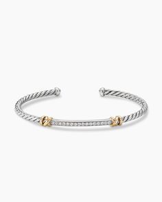 In the Helena Collection, David Yurman returns to the longer, leaner twist of his first handmade Cable bracelet, wrapping the iconic form with 18K yellow gold threads accented with hand-set pavé diamonds. Sterling silver with 18-karat yellow gold Pav diamonds, 0.25 total carat weight Bracelet, 3mm"} David Yurman Petite Helena Classic Cable Station Bracelet in Sterling Silver with 18K Yellow Gold with Diamonds, 3mm | Women's | Size XS Petite Jewelry, David Yurman Bracelet, Station Bracelet, Silver Bracelets For Women, Accesories Jewelry, Cable Bracelets, David Yurman Jewelry, Rare Gemstones, Gold Threads