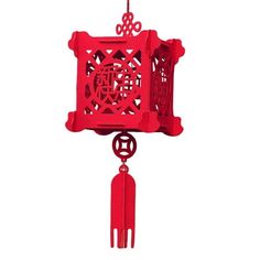 a red chinese style wind chime hanging from a hook on a white background,