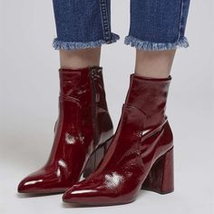 Step into style with our Women's Maroon Patent Leather Chunky Heel Ankle Boots. Featuring a trendy design, zip closure for easy wear, and a comfortable chunky heel for all-day chicness. Color: Maroon Material: Patent leather Heel Type: Chunky heel Heel height: 4" / 100 mm approx Product measurements were taken using size 8. Please note that measurements may vary by size. Toe: Pointed toe Side zipper closure design Handcrafted US sizing. Fits true to size. Chunky Heel Ankle Boots, Work Formal, Black Shoes Heels, Block Heel Ankle Boots, Red Boots, Heel Ankle Boots, Patent Leather Heels, Formal Attire, Ankle Bootie