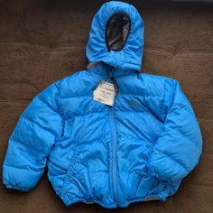 Nwt Size: 6/7 Blue Blue Hooded Puffer Jacket For Outdoor Activities, Blue Puffer Jacket With Fleece Lining, Blue Long Sleeve Puffer Jacket With Fleece Lining, Hooded Blue Outerwear For Hiking, Blue Outerwear With Fleece Lining For Outdoor Activities, Blue Outerwear With Fleece Lining For Cold Weather, Blue Long Sleeve Outerwear For Outdoor Activities, Blue Hooded Puffer Jacket For Hiking, Casual Blue Puffer Jacket With Fleece Lining