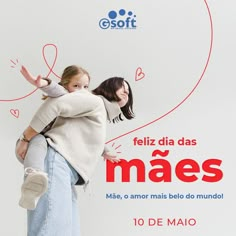 two girls are hugging each other in front of a sign that says, feliz dia dos maes