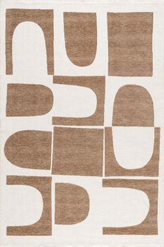 a rug with brown and white shapes on it