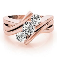 two stone diamond ring setting on an 18k rose gold band with white diamonds in the center