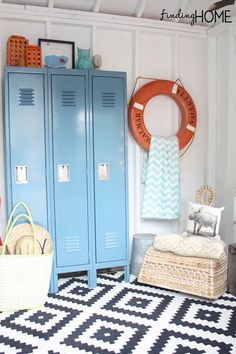 a room with two lockers and a rug on the floor