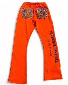 Introducing our latest must-have item: the "Already A celebrity" stacked sweatpants. These pants are not your average pair - featuring flair bottoms with stylish patchwork on the front and unique designs that are sure to make a statement. But it doesn't stop there - we've added faux fur back pockets for a touch of luxury and added flair.These stacked sweatpants are truly one-of-a-kind, offering a soft feel that is perfect for all-day comfort while still catching the eye of everyone around you. C Stacked Sweatpants, A Celebrity, Must Have Items, Color Orange, Orange Color, Must Haves, Faux Fur, Paradise, Sweatpants