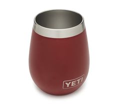 a red yeti cup sitting on top of a white table