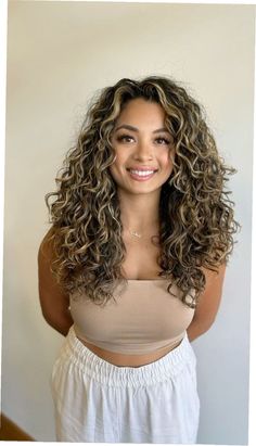 25 Vibrant Curly Hair Color Ideas for a Stunning Makeover Carmel Highlights On Black Curly Hair, Curly Haircut Long Hair, Blond Highlights On Black Hair Curly, Highlight In Curly Hair, Cute Hair Colors For Curly Hair, Balayage Hair On Curly Hair, Highlights In Curly Brown Hair, Blond Curly Highlights, Mixed Girl Highlights