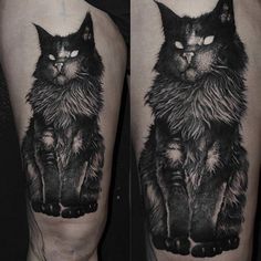 black and white cat tattoo on the leg