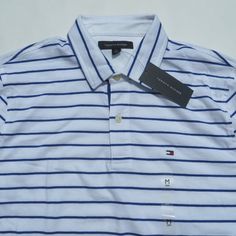 Tommy Hilfiger Sport Polo Men's Short Sleeve Polo Shirt Msrp: $49.99 100% Authentic Brand New Wit Tags Sizes: Xlarge / Xl Pictures Show The Exact Item You Are Getting In Size Medium Color: White And Blue Features: Men's Short Sleeve Polo Shirt Classic Fit 100% Cotton Light-Weight Material Machine Washable Front Button Closure Mini Flag On The Chest Measurements Laying Flat (Approximately): Size Xlarge: Chest, Arm Pit To Arm Pit: 22 3/4inch; Length: 30 Inch. Classic Tommy Hilfiger Striped Tops, Tommy Hilfiger White Collared Top, White Collared Tommy Hilfiger Top, Tommy Hilfiger White Summer Shirt, Tommy Hilfiger Polo Shirt Men, Mini Flag, Yellow Polo Shirt, Tommy Hilfiger Polo Shirt, Tommy Hilfiger Long Sleeve