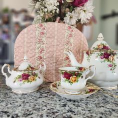 the tea set is sitting on the counter