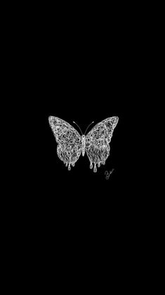 a black and white photo of a butterfly on a dark background with the words, i love you