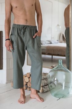 "Culottes linen pants for men to fill a gap in their everyday wear. They are breathable and durable to provide maximum comfort for wearing them on yoga exercise or just like loungewear.. The lounge style is redefined with straight-leg drop and cropped length. They have two side pockets and the drawstring closure. Elastic band on the waist and drawstrings makes the pants feel comfortable and stylish in everyday wear. Available in various colors and free to experiment with different styles and the Summer Parachute Pants With Pockets And Tapered Leg, Summer Linen Cargo Pants With Elastic Waistband, Summer Parachute Pants With Elastic Waistband And Tapered Leg, Summer Tapered Leg Pants With Pockets, Summer Harem Pants With Pockets For Loungewear, Summer Tapered Leg Harem Pants With Pockets, Cropped Leg Summer Bottoms With Pockets, Cropped Leg Bottoms With Pockets For Summer, Summer Cropped Leg Bottoms With Pockets