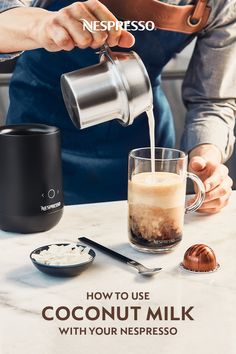 a person pours coffee into a glass on top of a table with other items