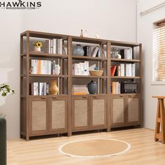 a living room filled with lots of books and furniture