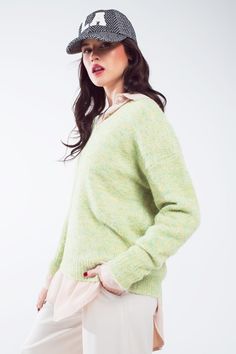 Introducing our Green Fluffy Knit Sweater with a Stylish V-Neck – a soft and comfortable addition to your everyday wardrobe, perfect for daily wear.   Key Features:     Material:  Crafted from a blend of 70% Polyester, 21% Polyamide, 8% Wool, and 1% Elastane, this sweater offers a fluffy and cozy knit.   V-Neck Design:  The V-neck adds a touch of style and versatility to this sweater, making it suitable for various occasions.   Ribbed Details:  The ribbing at the bottom, cuffs, and collar enhances the sweater's look while adding comfort.   Regular Fit:  Designed for a regular fit, it ensures both comfort and style for your daily wear.   Full Length:  This sweater is perfect for everyday use, providing warmth and softness.   Fit:  Model is wearing size U. Model is: 33-24-35 Height: 5'8.   T Tan Scarf, Fluffy Knit, Sleeves Style, Cozy Knits, Spring Season, Everyday Wardrobe, Hat Hairstyles, Soft Knits, Neck Designs