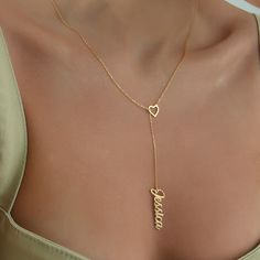 14K Solid Gold Name Necklace with Heart/Star Symbol, Personalized Name Necklace, Name Necklace, Bridesmaid Gift, Christmas Gifts NAME NECKLACE WITH STAR / HEART   ★ Made to Order   ★ Dimensions: Heart 9x8mm Name 8x32mm based on font   ★ Material: High Quality 925 Silver, 14K Solid Gold   ★ Colors: Gold, Rose Gold, White Gold   ★ Features: Handmade, Nickel-free, Tarnish-resistant, Hypoallergenic, Handcrafted with eco-friendly materials   ★ Packaging: Ready to Gift in a Jewelry Box HOW TO ORDER:   1️⃣ Select material and color   2️⃣ Choose Chain Length.   3️⃣ Enter Name, Font Number and STAR or HEART in the Personalization Box CHAIN SIZE GUIDE:    ➤ 12" Necklace: Fits comfortably on children; may be short for adults    ➤ 14" Necklace: Fits like a choker    ➤ 16" Necklace: Sits at the collarb Heart Shaped Name Necklace For Birthday, Heart-shaped Name Necklace For Birthday, Name Necklace For Wedding Gift, Heart Shaped Name Necklace For Wedding, Heart-shaped Name Necklace For Wedding, Name Necklace For Wedding Christmas Gift, Customizable Party Necklaces, Mother's Day Party Name Necklace, Valentine's Day Wedding Name Necklace